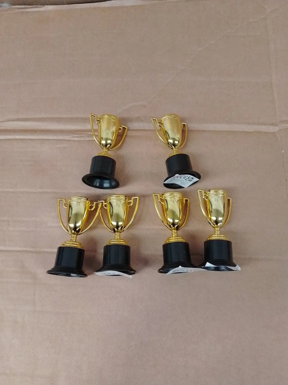 Baker Ross P670 Gold Trophies Kids Party Fillers Small Toys Prizes 5 Pack New