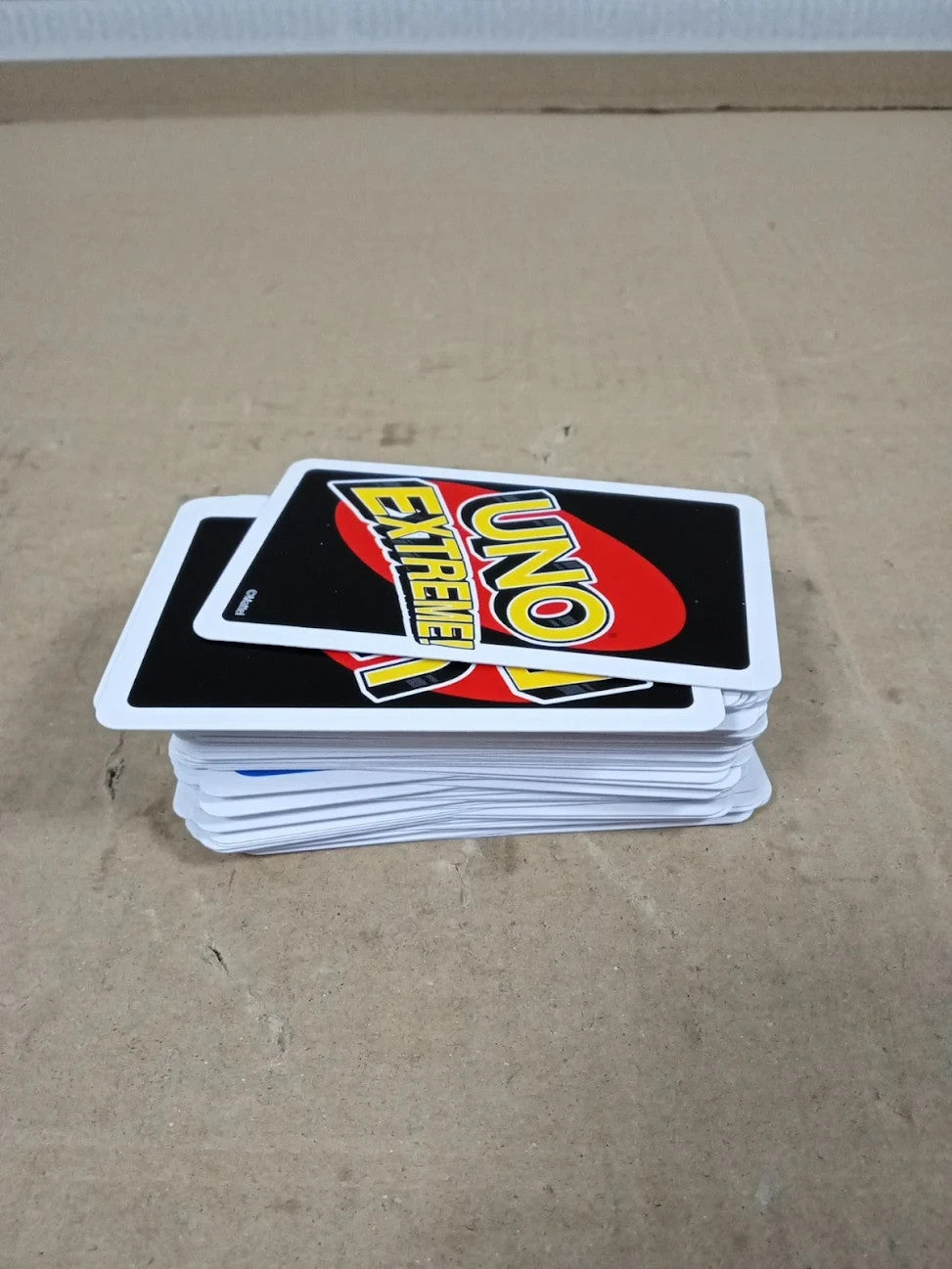 UNO GXY75 Extreme Card Game Featuring Random Action Launcher Light Sounds Age 7+