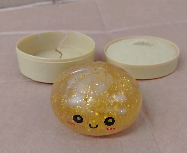 Dumpling Squishy Toy Gold Stress Ball Fidget Sensory Squeeze Relief Design New