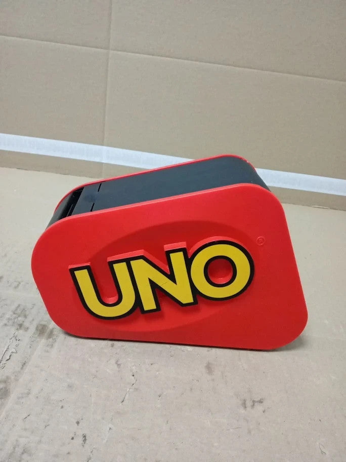 UNO Extreme Card Game Featuring Random Action Launcher Lights Sounds 7+