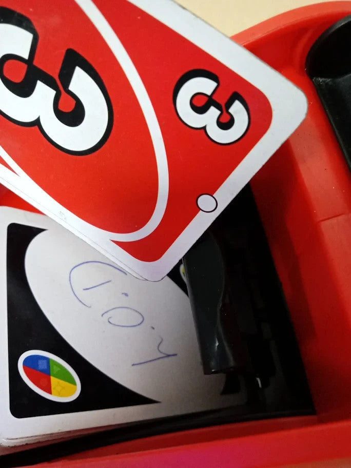 UNO Extreme Card Game Featuring Random Action Launcher Lights Sounds 7+